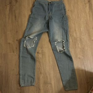 High waisted jeans  size small  2 back pocket knees out cut sexy stretch